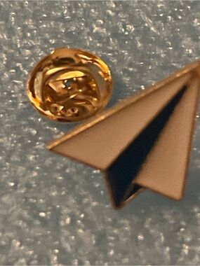 Enamel Paper Airplane Pin in Black and Gold